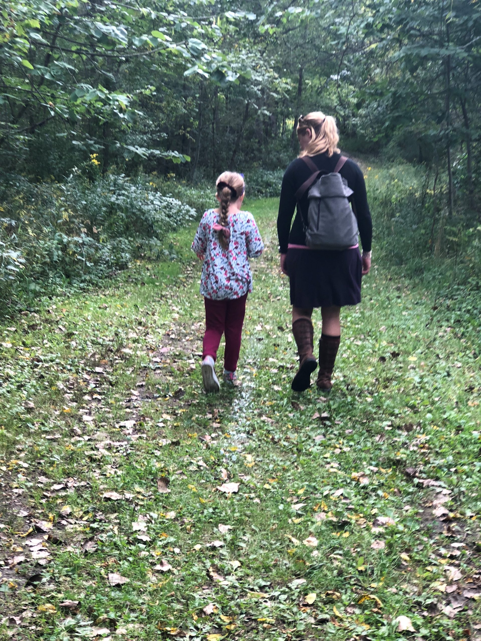 Attorney Mason and her daughter hiking on Earth Day in Racine County